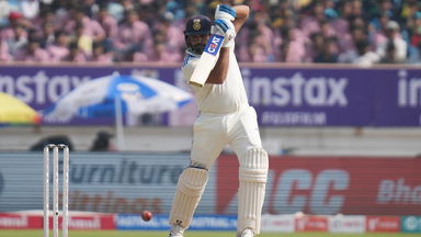 Stand and deliver: Rohit's magnificent punch through extra cover for four off Anderson