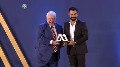 Virat Kohli receives the Polly Umrigar Award