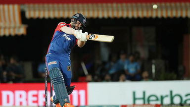Rossouw on the charge: Smashes two cracking sixes off Rabada