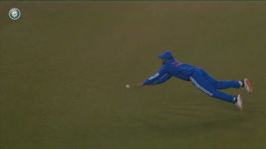NEARLY! Tilak Varma's splendid diving effort almost dismisses Najibullah