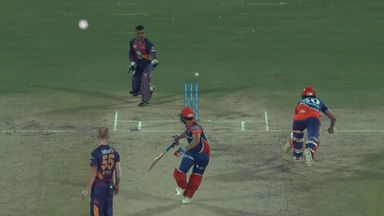Dhoni slides one on the stumps - Almost