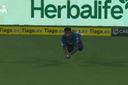 SHARP: Gowtham grabs an excellent diving catch near the ropes