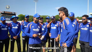 Saransh Jain receives his Test cap from Ravindra Jadeja