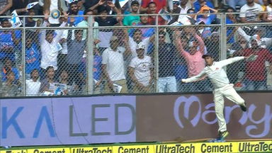 A Ball boy wonder at the boundary ropes