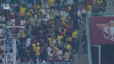 Fan-tastic! An unbelievable one-handed stunner in the crowd
