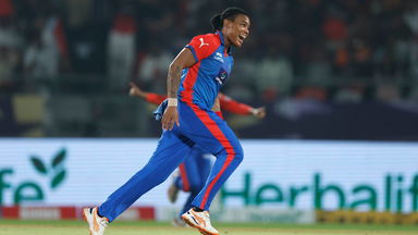 What a start: Henry castles Harris off her first ball