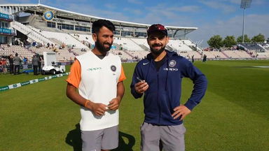 Captain Kohli in conversation with Cheteshwar Pujara