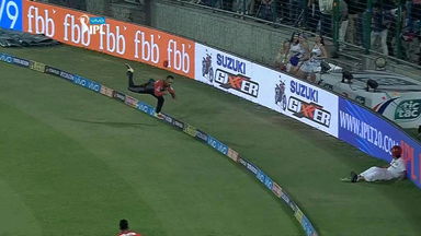 Flying Mandy saves a certain boundary