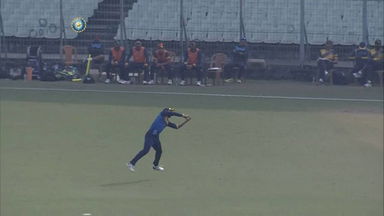 Suraj Kumar completes a tumbling catch