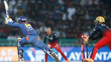 Quick hands: Karthik pulls off an excellent stumping