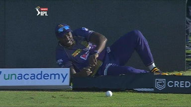 Russell drops catch, injures knee