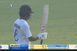 Saha’s gritty fifty takes India to safety