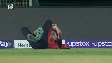 Super grab: Jansen takes a brilliant catch running backwards