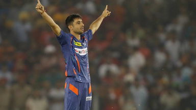 Safe hands: Bishnoi hangs on to a tricky catch off his own bowling