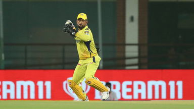 Bulls-eye: Dhoni wraps up the innings with a perfect direct-hit