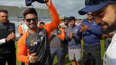 Rishabh Pant gets his Test cap from Virat Kohli