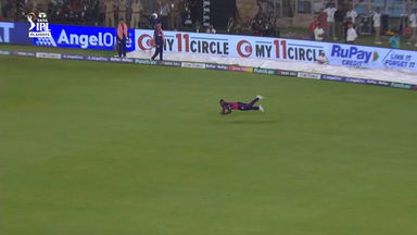 Judge. Run. Dive: Powell pulls off fantastic low diving catch